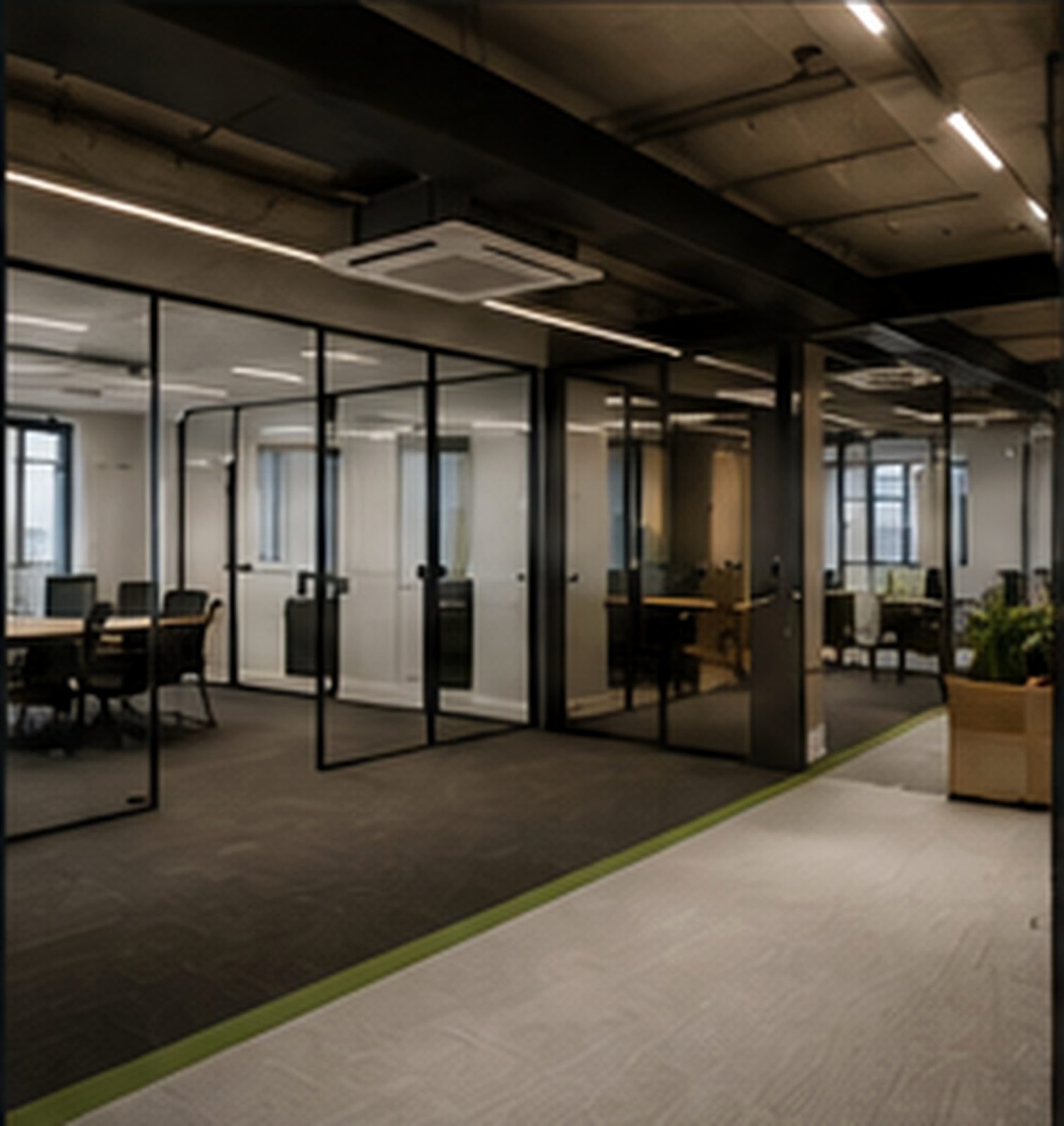 Commercial office refurbishment concept in Islington — glazed meeting-room partitions and LED lighting
